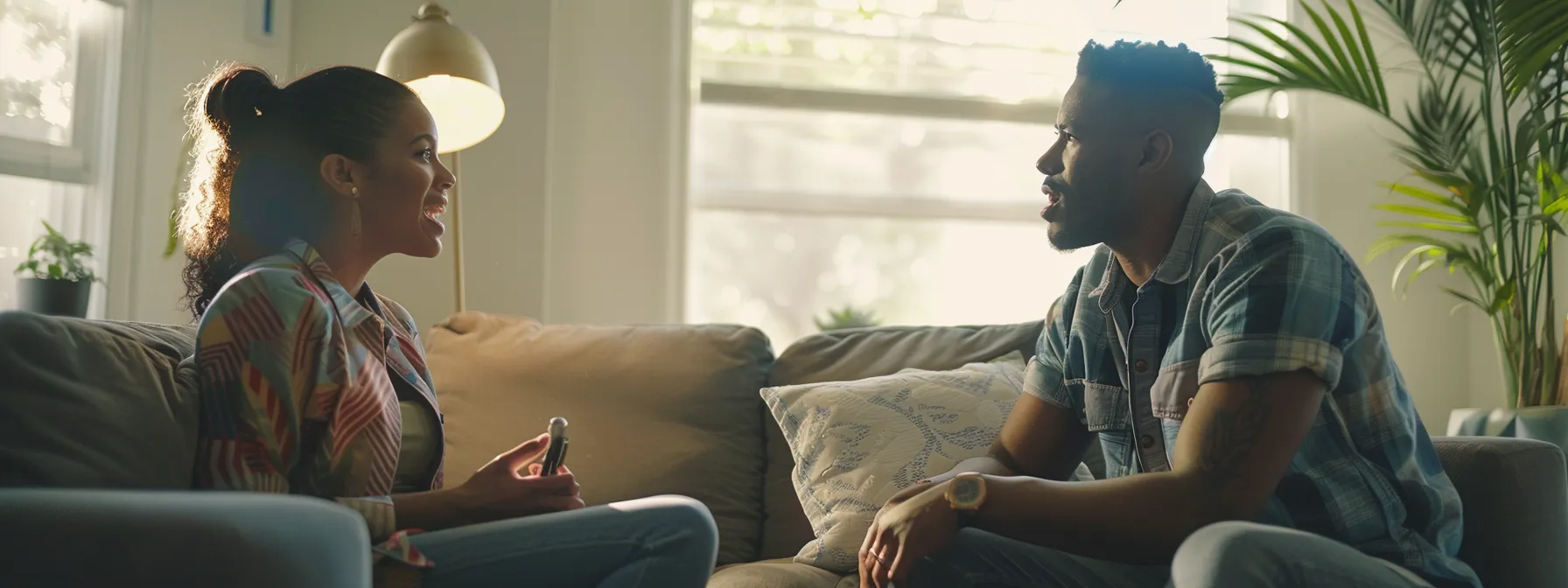 a couple discussing mortgage options with a san diego mortgage company.