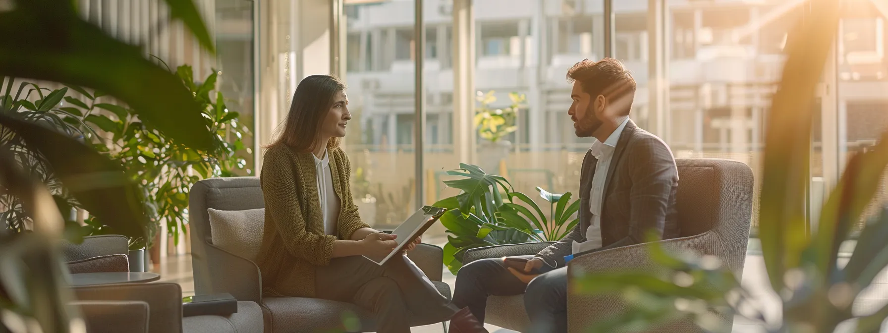 a person discussing refinancing options with a mortgage broker in a modern office setting.