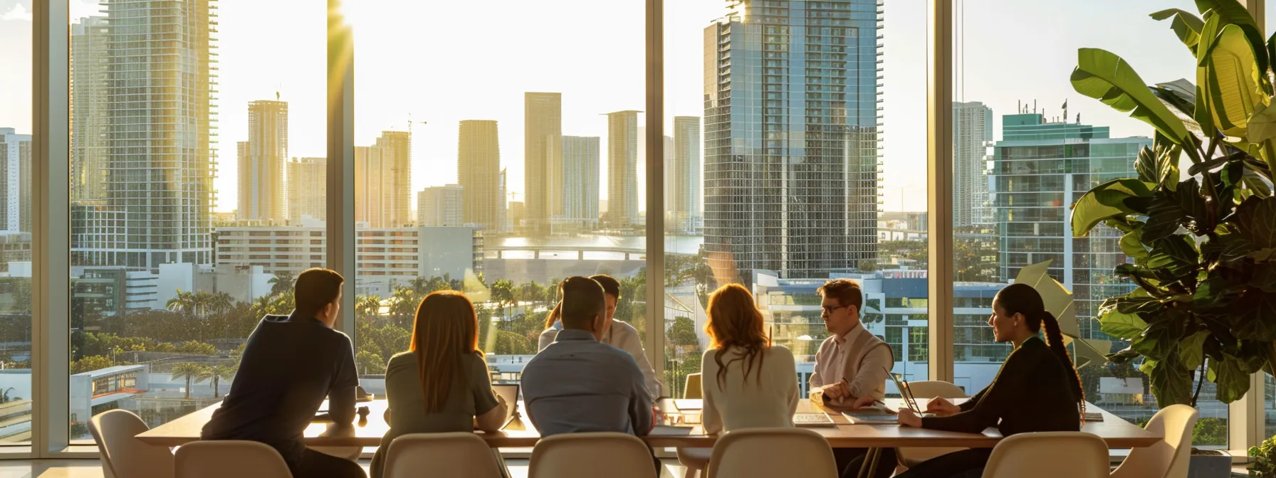 a group of people meeting with mortgage lenders in a modern office overlooking the miami skyline.